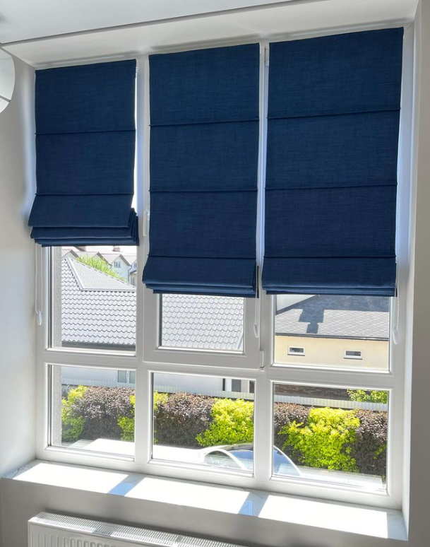 Вибір віконного покриття: штори, рулонні штори чи римські штори